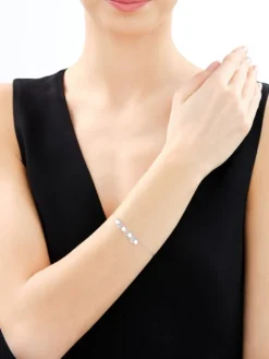 Bransoletka srebrna - koła, rozety