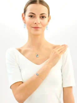 Bransoletka srebrna z cyrkoniami, szlifowanym szkłem i cyrkoniami - motyl, kwiaty