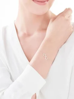 Bransoletka z białego i różowego złota z diamentami - róża, nieskończoność - 0,06 ct - próba 375