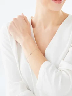 Bransoletka z białego złota z diamentami - skrzydło - 0,01 ct - próba 375