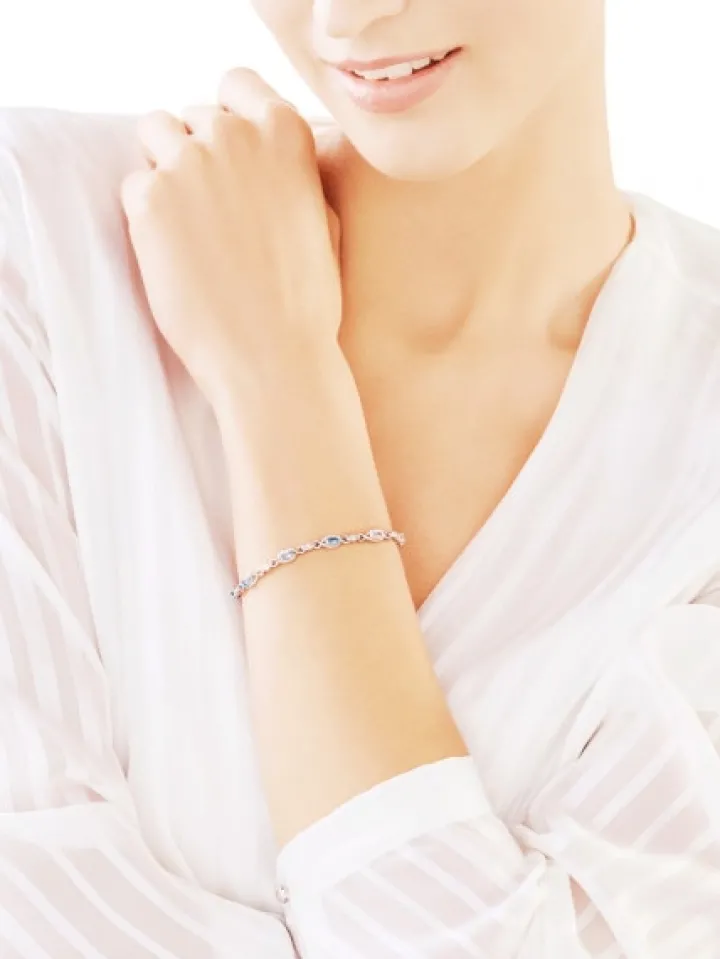 Bransoletka z białego złota z diamentami i topazami - 18 cm - próba 375