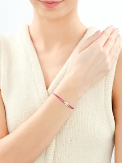 Bransoletka z cyrkoniami i elementami z żółtego złota