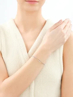 Bransoletka z cyrkoniami i elementami z żółtego złota