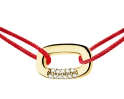 Bransoletka z cyrkoniami i elementami z żółtego złota