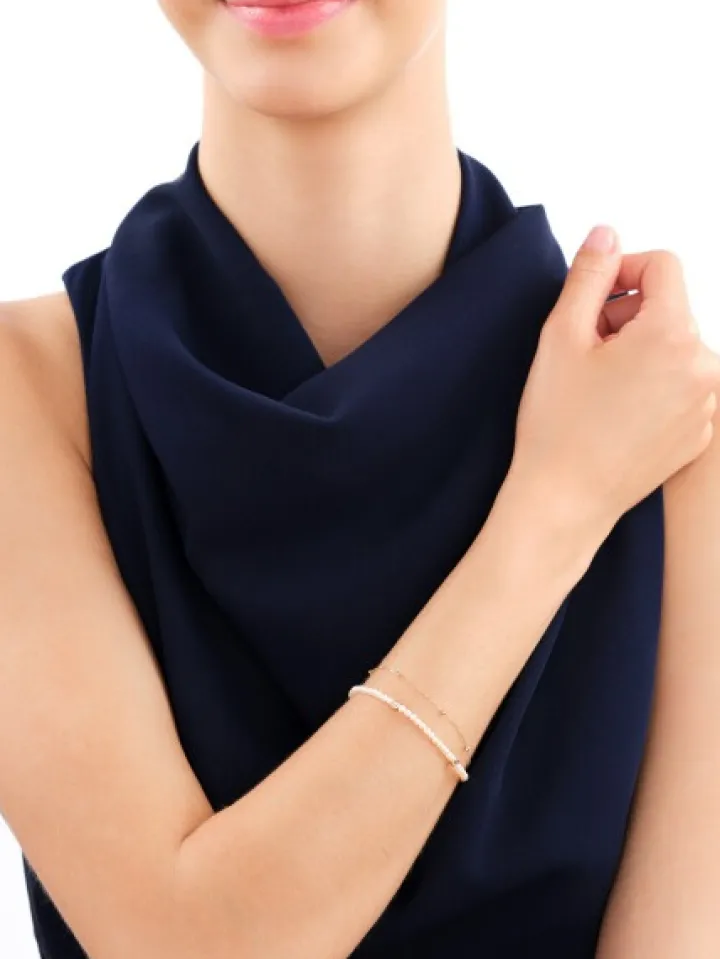 Bransoletka z diamentami, perłami i elementami żółtego złota - 18 cm - próba 375