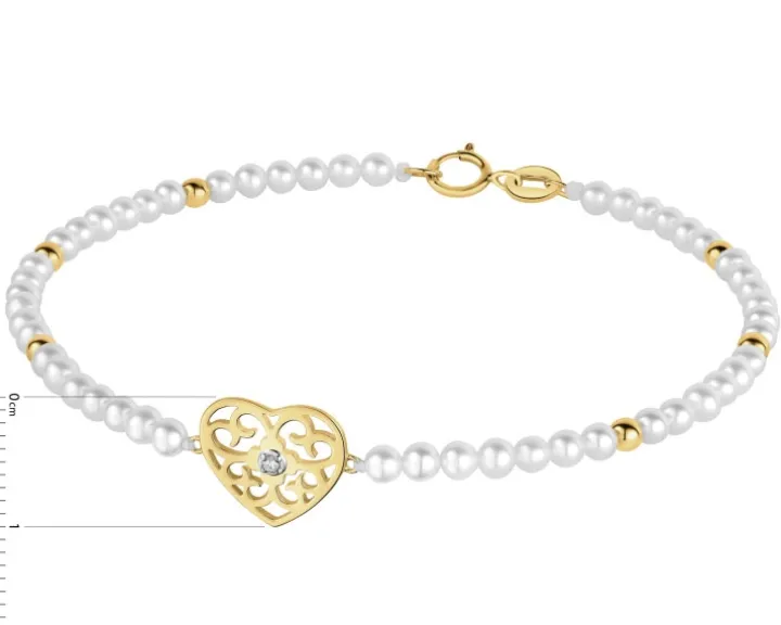 Bransoletka z diamentem, perłami i elementami żółtego złota - serce - 18 cm - próba 375