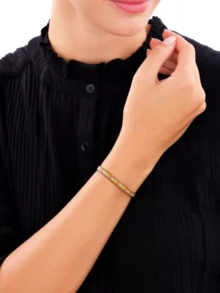 Bransoletka z elementami z żółtego złota i koralikami