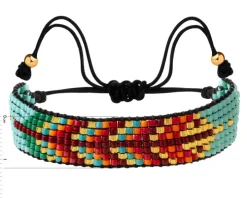 Bransoletka z elementami z żółtego złota i koralikami