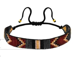 Bransoletka z elementami z żółtego złota i koralikami