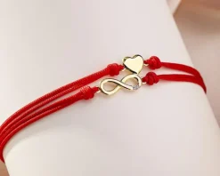 Bransoletka z elementami żółtego złota i diamentem - nieskończoność, serce - 0,004 ct - próba 375