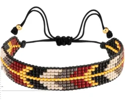 Bransoletka z elementami z żółtego złota i koralikami