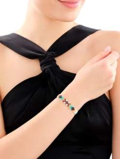 Bransoletka z elementami z żółtego złota i koralikami