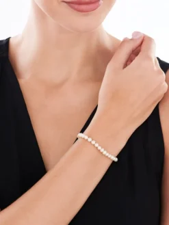 Bransoletka z elementami z żółtego złota - perły