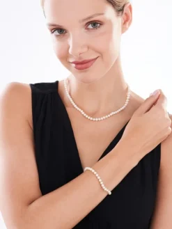 Bransoletka z elementami z żółtego złota - perły