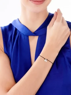 Bransoletka z elementami srebra - litera M, koniczyna