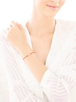 Bransoletka z elementami żółtego złota i diamentem - nieskończoność - 0,004 ct - próba 375