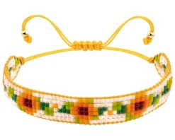 Bransoletka z elementami z żółtego złota i koralikami - kwiaty