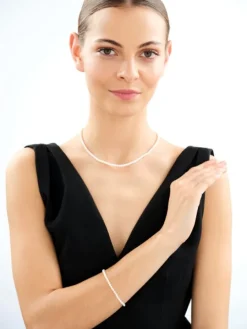 Bransoletka z elementami z żółtego złota - perły