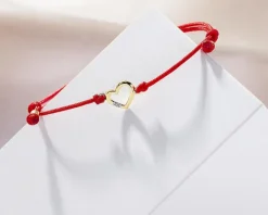 Bransoletka z elementami żółtego złota i diamentem - serce - 0,004 ct - próba 375