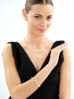 Bransoletka z elementami z żółtego złota - perły