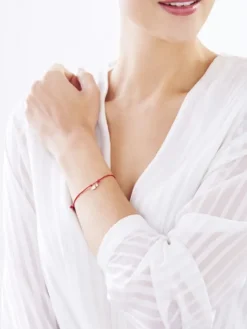 Bransoletka z elementami z żółtego złota z cyrkonią - Serce