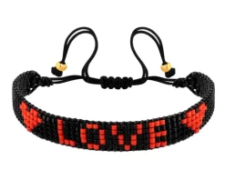 Bransoletka z elementami z żółtego złota i koralikami - serca, love