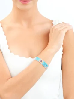 Bransoletka z elementami z żółtego złota i koralikami - flamingi