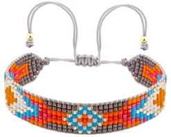 Bransoletka z elementami z żółtego złota i koralikami