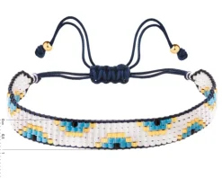 Bransoletka z elementami z żółtego złota i koralikami