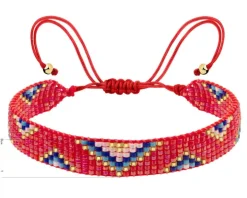 Bransoletka z elementami z żółtego złota i koralikami