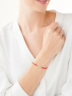 Bransoletka z elementami z żółtego złota - serce nieskończoność