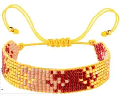 Bransoletka z elementami z żółtego złota i koralikami