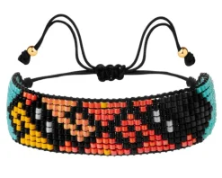 Bransoletka z elementami z żółtego złota i koralikami