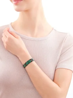 Bransoletka z elementami z żółtego złota i koralikami