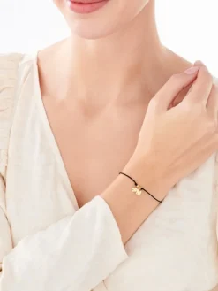 Bransoletka z elementami srebra - litera M, koniczyna