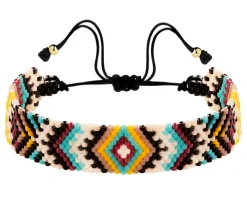 Bransoletka z elementami z żółtego złota i koralikami