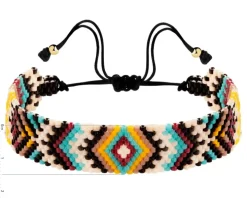 Bransoletka z elementami z żółtego złota i koralikami