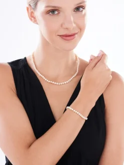 Bransoletka z elementami z żółtego złota - perły