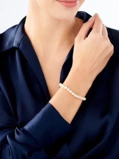 Bransoletka z elementami z białego złota - perły