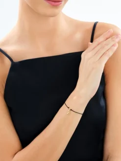 Bransoletka z elementami srebra - litera A, motyl