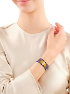 Bransoletka z elementami z żółtego złota i koralikami