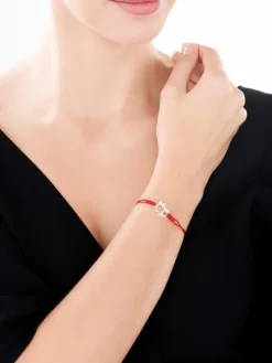 Bransoletka z elementami  żółtego złota i diamentami - sowy - 0,02 ct - próba 375