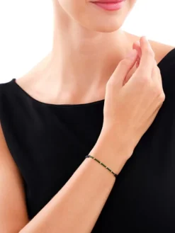 Bransoletka z elementami z żółtego złota i koralikami