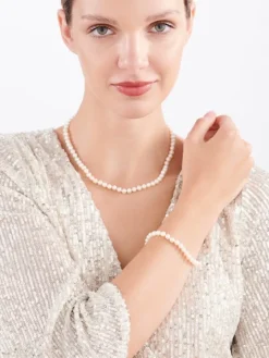 Bransoletka z elementami żółtego złota - perły