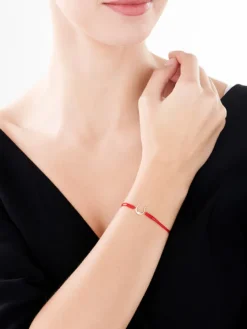 Bransoletka z elementami żółtego złota i brylantem - podkowa, serce - 0,01 ct - próba 375