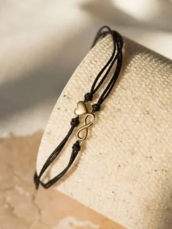 Bransoletka z elementami żółtego złota i diamentem - nieskończoność, serce - 0,004 ct - próba 375