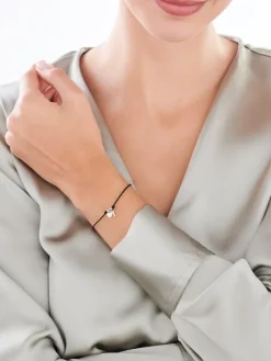 Bransoletka z elementami srebra - litera T, serce