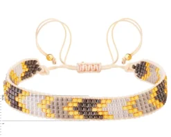Bransoletka z elementami z żółtego złota i koralikami