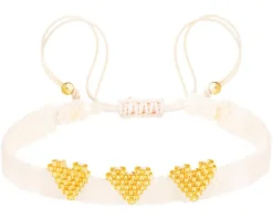 Bransoletka z elementami z żółtego złota i koralikami - serca