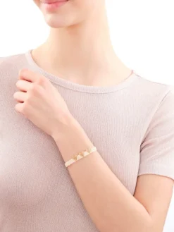 Bransoletka z elementami z żółtego złota i koralikami - serca